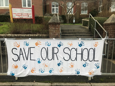 save our school banner